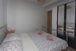 Posteľ alebo postele v izbe v ubytovaní Gospodar Apartments