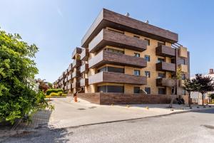 a building on the side of a street at Algarve 360º Experience in Loulé