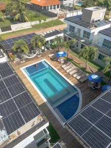 an overhead view of solar panels on top of a house at Pousada Oásis Tropical in Porto De Galinhas +20 photos