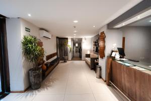 a hallway of a hospital with a waiting room at Carppa Hotel in Fortaleza