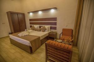Voodi või voodid majutusasutuse Avenra Beach Hikkaduwa toas
