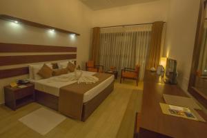 Voodi või voodid majutusasutuse Avenra Beach Hikkaduwa toas