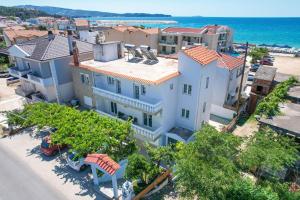 an aerial view of a house on the beach at Solere Apartments in Limenaria