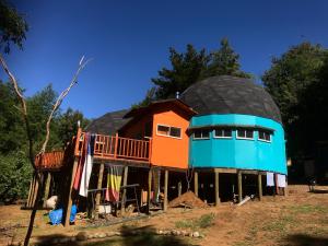a house with a dome on top of it at Chakana Newen Refugio in San Clemente