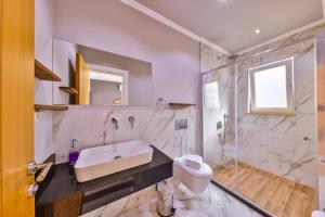 a bathroom with a sink and a shower at DuruPduru Kaş in Kaş +59 photos