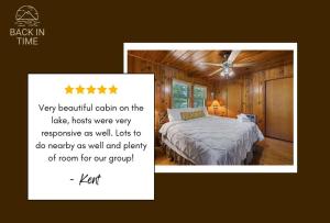 a bedroom with a bed with a white comforter at Rustic Lakefront Home with Beach in Sevierville