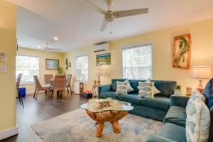 a living room with a couch and a table at Andros Suite in Key West