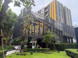an office building with a black facade in a park at A Cozy Condo Near Central-BJ in Ban Rangeng