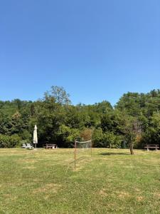 a field with a goal in the grass at Green River - robinzonski kamp in Duga Resa