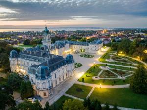 an aerial view of a building with a clock tower at Csobogó Suites Apartman in Keszthely