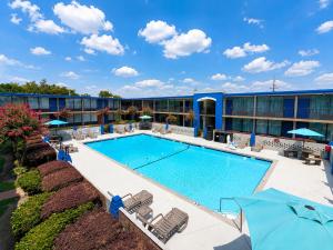 an image of a pool at a hotel at Clarion Inn in Greenville
