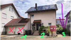 a house with solar panels on the side of it at 2 Zimmer Apartment am Europapark - auf Wunsch klimatisiert für 10,-Aufpreis pro Nacht in Rust