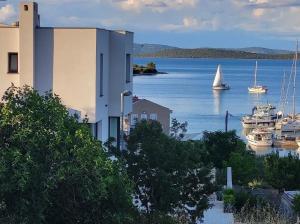a view of a harbor with boats in the water at Sea Star in Žman