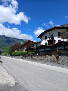 a large building on the side of a road at LOCANDA Alla Paia in Pracul