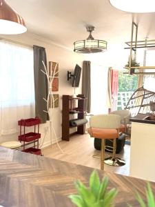 a living room with chairs and a table at Catskill Apartment, Little Love Bird #5 in Shandaken