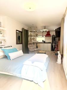 a bedroom with a large bed in a room at Catskill Apartment, Little Love Bird #5 in Shandaken