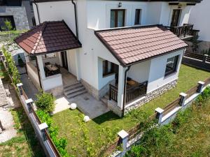 an aerial view of a house with a gazebo at MonteBreza Spa Apartment Jacuzzi, Sauna & Free Parking in Kolašin