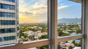 a view of a city from a building at The Premier Centauras in Islamabad