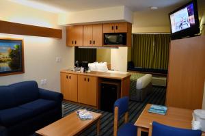 A kitchen or kitchenette at Microtel Inn & Suites by Wyndham Chihuahua