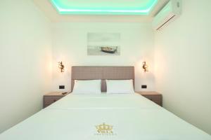 a bedroom with a large bed with a skylight at Villa President 4 in Krimovice +21 photos