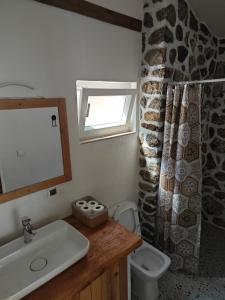 Vonios kambarys apgyvendinimo įstaigoje Villa Reset