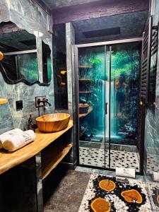 a bathroom with a shower with a wooden sink at Check in Silence in Tylicz +51 photos