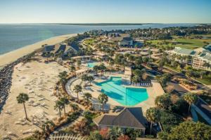 an aerial view of a resort on the beach at 1315 Pelican Watch Villas-Beachfront & Amenities - on Sale in Seabrook Island