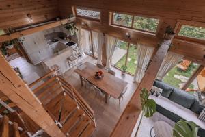 an overhead view of a living room and kitchen in a log cabin at Monte Chalet Kolašin brvnara sa saunom in Kolašin