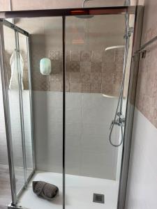 a shower with a glass door in a bathroom at Sweet House 3 in Arrecife