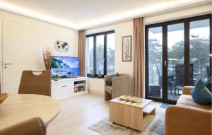 a living room with a couch and a table at Princess in Binz