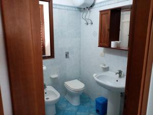 a bathroom with a toilet and a sink at Residence Punta Sottile A 2 passi dalla spiaggia di cala francese Lampedusa in Lampedusa +48 photos