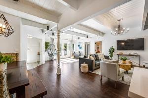 a living room with a couch and a table at Paradise in the Palisades in Lake Arrowhead