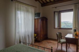 A bed or beds in a room at Villa le Vigne