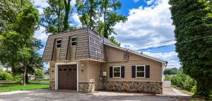 a small house with a garage at Waterfront Gem in Willingboro