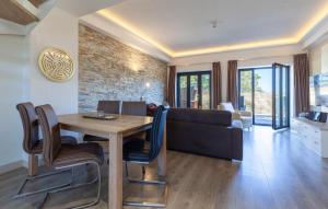 a living room with a table and a couch at Amber in Binz