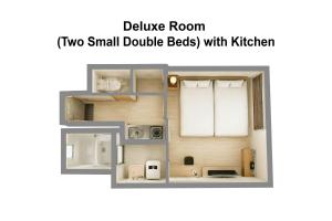a floor plan of two small double bedrooms with kitchen at goom Hotel Nakasu in Fukuoka