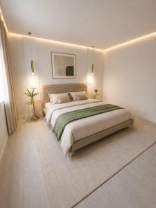 a bedroom with a large bed in a room at Баракат in Chon-Sary-Oy
