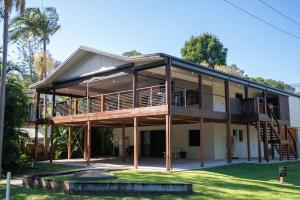 a large house with a deck and a balcony at Amity Escape - Sleeps 14 in Amity Point