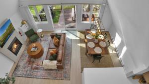 an overhead view of a living room with a couch and a table at Waterfront, Hot Tub, Dock Kayaks, Movie Game Room in Lake Ariel
