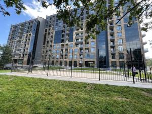 a building with a fence in front of it at Forest view Tsaghkadzor in Tsaghkadzor