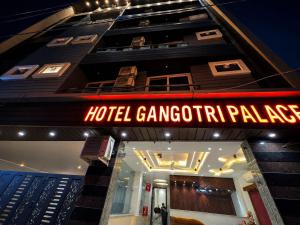 a hotel signage on the side of a building at Sitara Premium Gangotri Palace, Tapovan in Rishīkesh