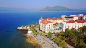 an aerial view of a town next to the water at Edipsos Serenity Suites in Loutra Edipsou