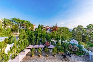 an aerial view of a house with a garden at Maro Boutique Villa in Da Lat