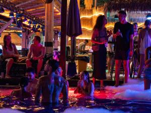 a group of people in the water in a pool at K-Bunk AoNang Center 18-39 in Ao Nang Beach +47 photos