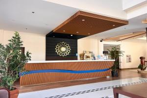 a lobby of a hospital with a reception counter at NSCC Stella Maris Hotel & Convention Center in Cabugao +115 photos