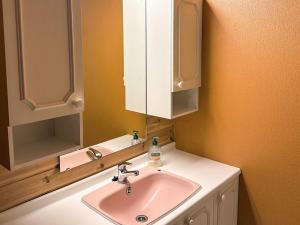 a bathroom with a sink and a mirror at 8 person holiday home in Jelsa-By Traum in Jelsa +27 photos
