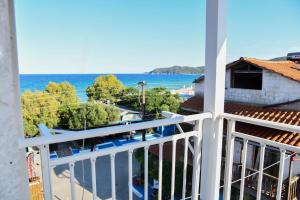 a balcony with a view of the ocean at Villa Kostas Sarti in Sarti