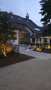 a large building with a lot of windows at Vila Ieva in Palanga