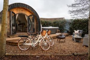 two bikes parked in front of a gazebo at Glamping Retreats in Norwich