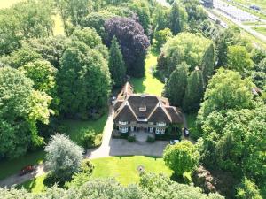 an aerial view of a house in the woods at Huize Beukenstein in Lochem